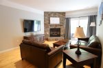 Gas Fireplace and Flat Screen TV in Living Room at Forest Ridge Condo